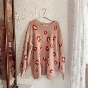 pink animal print sweater